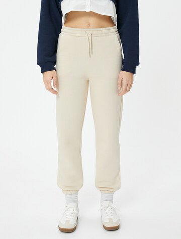 Koton Tapered Broek in Beige: voorkant