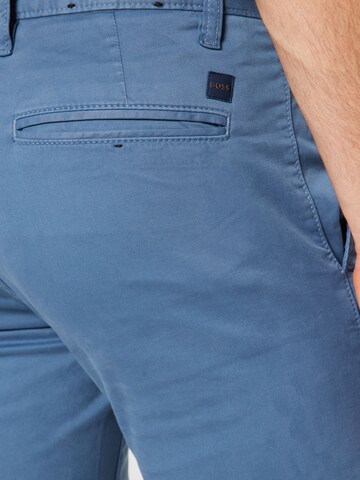 Slimfit Pantaloni chino 'Taber' di BOSS in blu