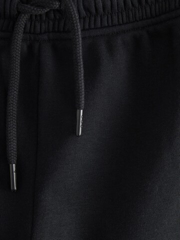Next Tapered Broek in Zwart