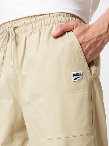 Loosefit Pantaloni di PUMA in beige