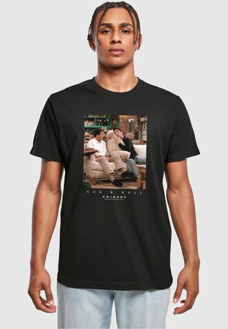 ABSOLUTE CULT T-Shirt 'Friends - Hug And Roll' in Schwarz: predná strana