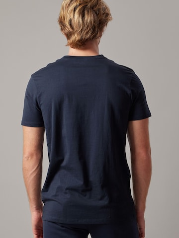 Maglietta 'T-Shirt Scollo a V' di OWN Off With Nature in blu