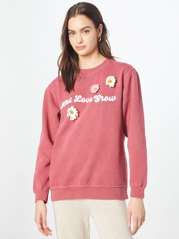 Oasis Sweatshirt 'Let Love Grow' in Roze: voorkant