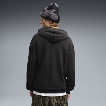 PUMA Sportsweatshirt 'Essentials Elevated No. 1' in Zwart