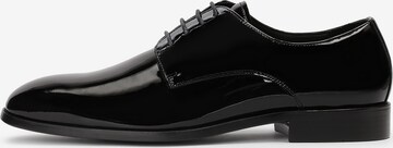 Kazar Lace-Up Shoes in Black: front