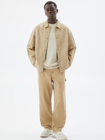 Pull&Bear Loose fit Trousers in Brown: front