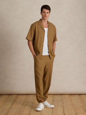 DAN FOX APPAREL Tapered Pants 'Gino' in Brown