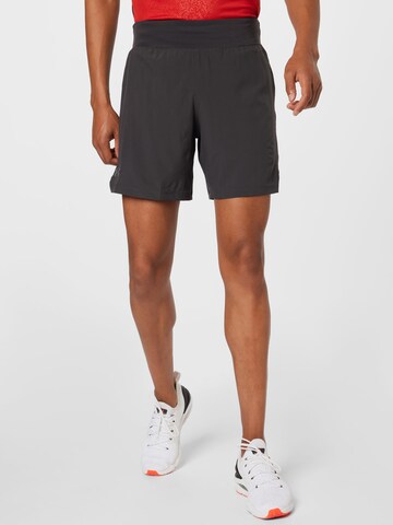 Regular Pantalon de sport 'SpeedPocket' UNDER ARMOUR en gris : devant