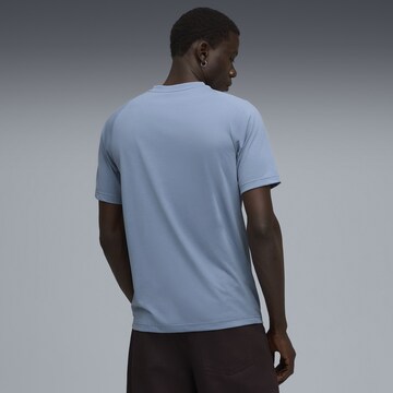 PUMA Performance shirt 'Evostripe' in Blue