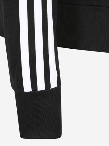 ADIDAS SPORTSWEAR Outdoorová bunda 'Primegreen Essentials Warm-Up  3-Stripes' – černá
