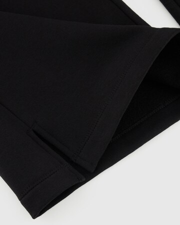 Champion Authentic Athletic Apparel Loosefit Sporthose in Schwarz