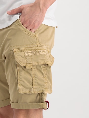 regular Pantaloni cargo di ALPHA INDUSTRIES in beige