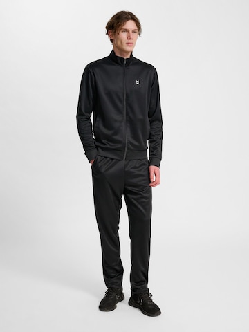 Hummel Trainingspak 'Pulse' in Zwart: voorkant