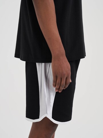 AND1 Regular Hose in Schwarz