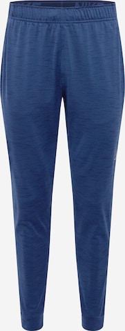 NIKE Workout Pants in Blue: front