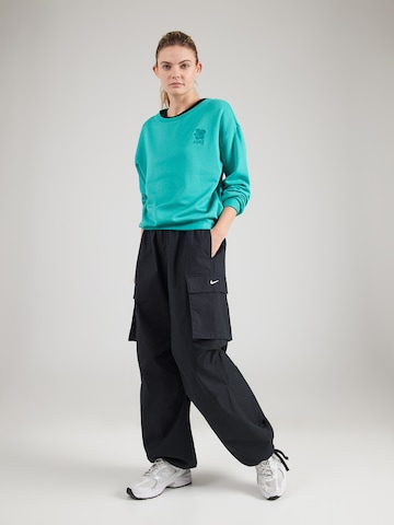 ROXY Sport sweatshirt 'SURFING BY MOON' i grön