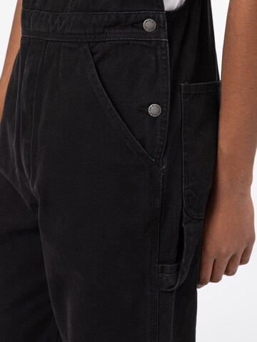 regular Pantaloni con pettorina di DICKIES in nero