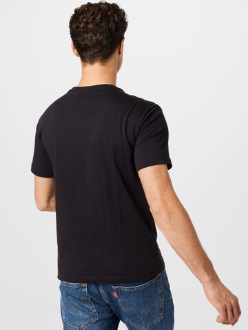 Champion Authentic Athletic Apparel - Camisa em preto