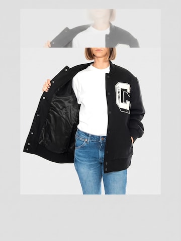 Carhartt WIP Tussenjas 'W' Brown Ducks Jacket Black' in Zwart