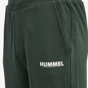 Hummel Zúžený strih Športové nohavice 'Legacy' - Zelená