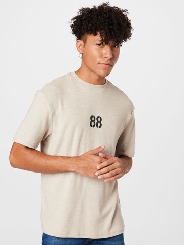 T-Shirt River Island en beige : devant