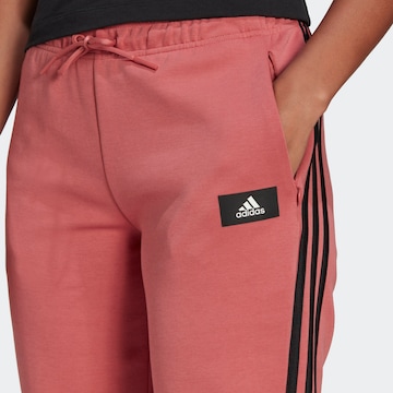 ADIDAS SPORTSWEAR Tapered Urheiluhousut 'Future Icons 3-Stripes' värissä vaaleanpunainen