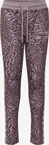 Hummel Slim fit Workout Pants 'WILD' in Purple: front