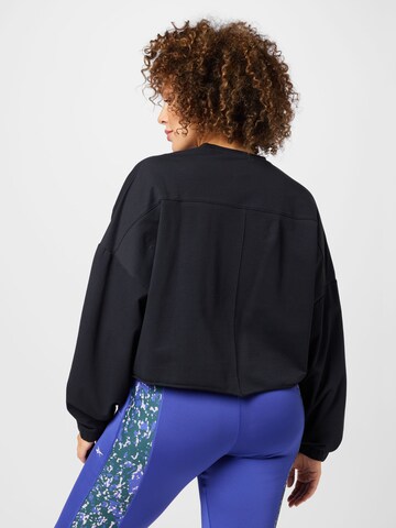 Reebok - Camiseta deportiva 'Modern Safari' en negro