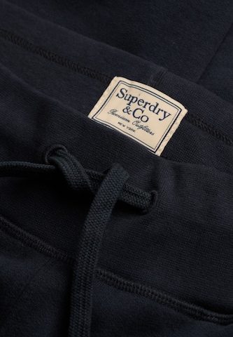 Superdry & Co Zúžený Kalhoty 'ESSENTIAL' – modrá