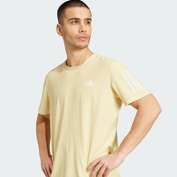 ADIDAS PERFORMANCE - Camiseta funcional 'Own The Run' en amarillo