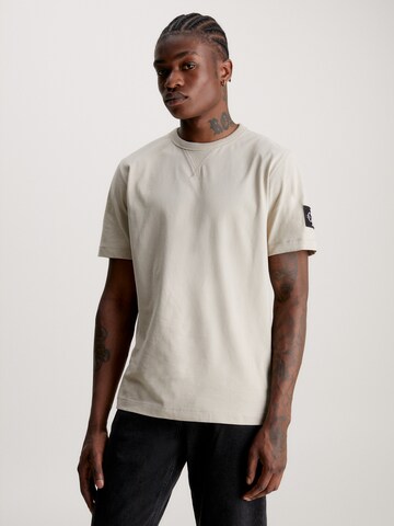 T-Shirt Calvin Klein Jeans en beige : devant