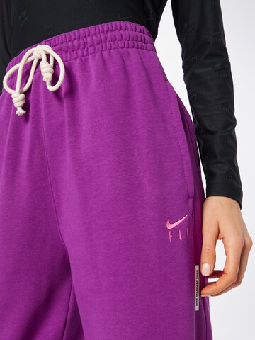 NIKE Tapered Sports trousers in Pink