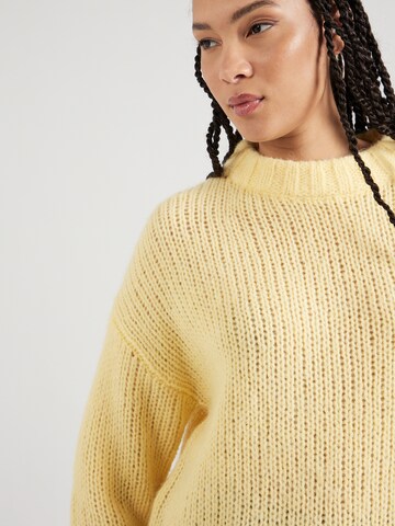 HUGO Пуловер 'Sloos' в жълто