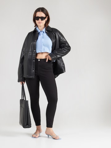 Vero Moda Curve Skinny Jeans 'VMCPOLLY' in Black