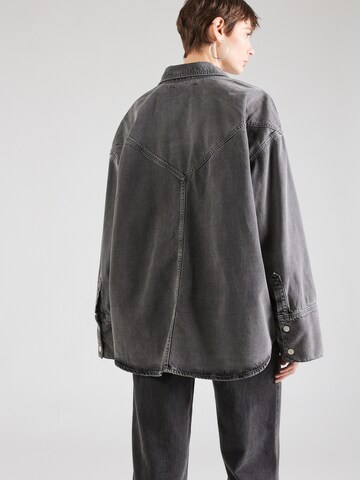 REMAIN Prehodna jakna | siva barva