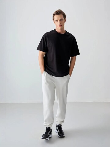 Tommy Life T-Shirts in Schwarz