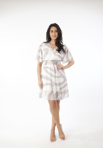 Elara Kjole i beige: forside