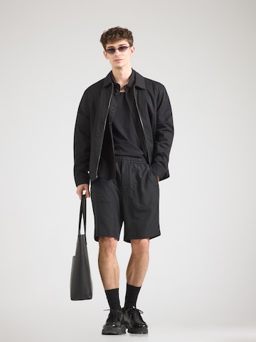 Calvin Klein Ohlapna forma Hlače | črna barva