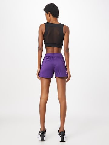 regular Pantaloni sportivi di Hummel in lilla