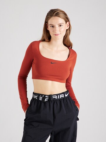 Nike Sportswear - Camiseta en naranja: frente