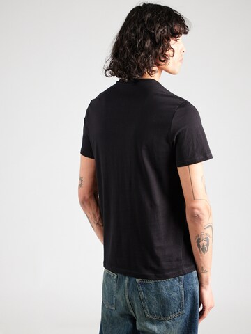 GUESS T-Shirt in Schwarz