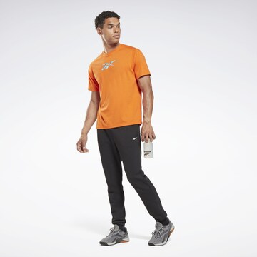 Reebok Performance Shirt in Orange