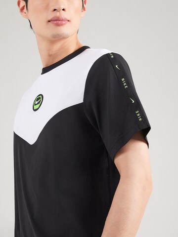 Nike Sportswear - Camisa em preto