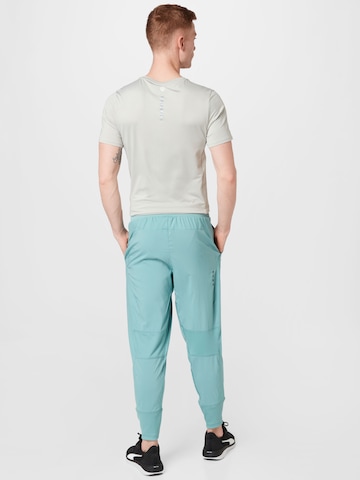 Tapered Pantaloni sport 'STUDIO' de la PUMA pe albastru