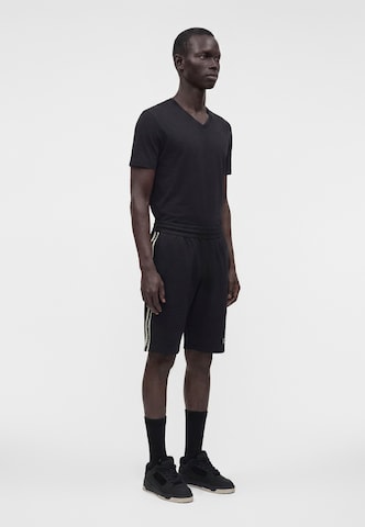 EA7 Emporio Armani - regular Pantalón en negro: lado