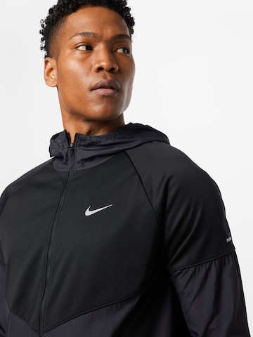 NIKE Sportjacke 'RPL Miler' in Schwarz