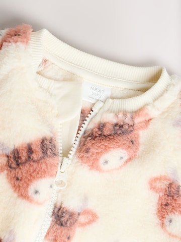 Next Sparkdräkt/body i beige