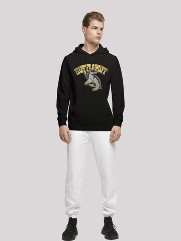 Felpa 'Harry Potter Hufflepuff Sport Emblem' di F4NT4STIC in nero