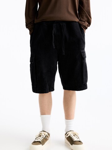 Wide leg Jeans cargo di Pull&Bear in nero: frontale