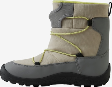 Reima Talvisaappaat 'Ensilumi' värissä beige: etupuoli